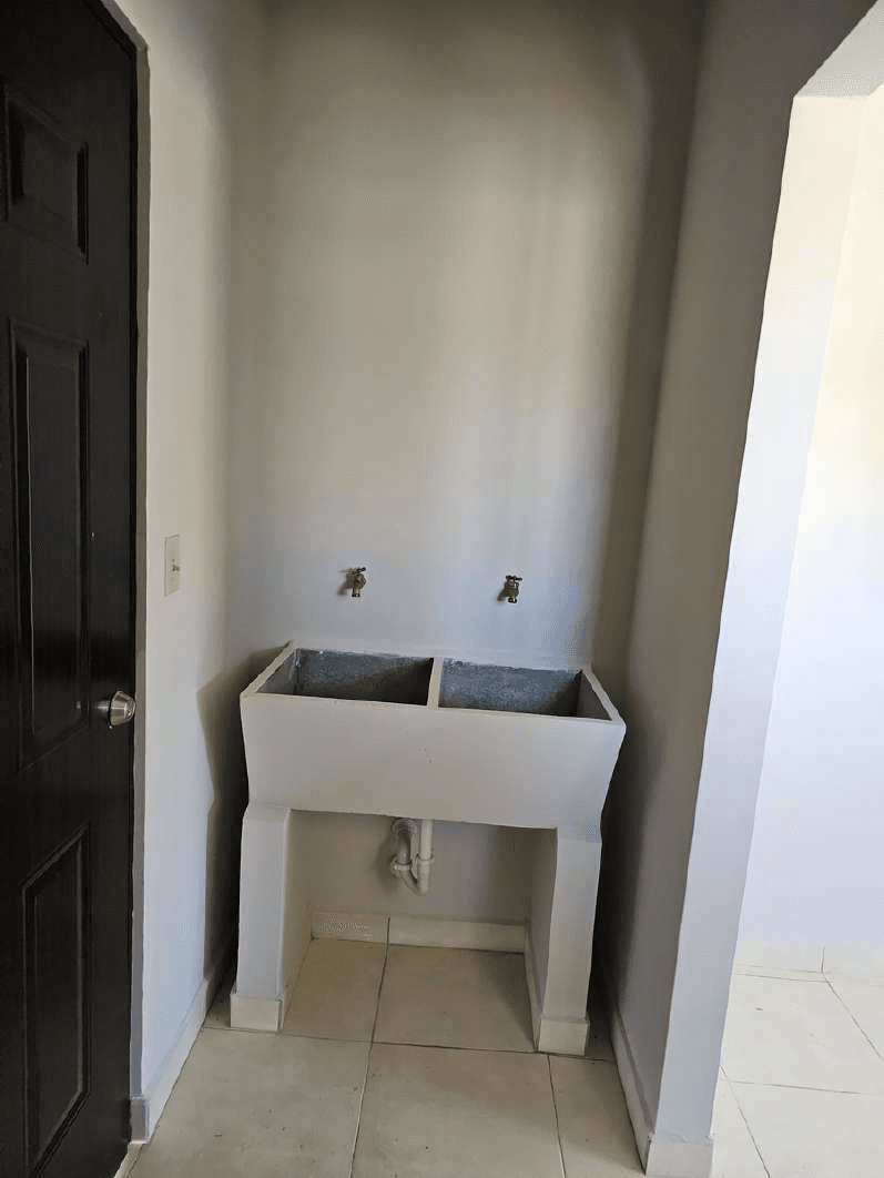 Área de lavandería de vivienda del proyecto Buenavista
